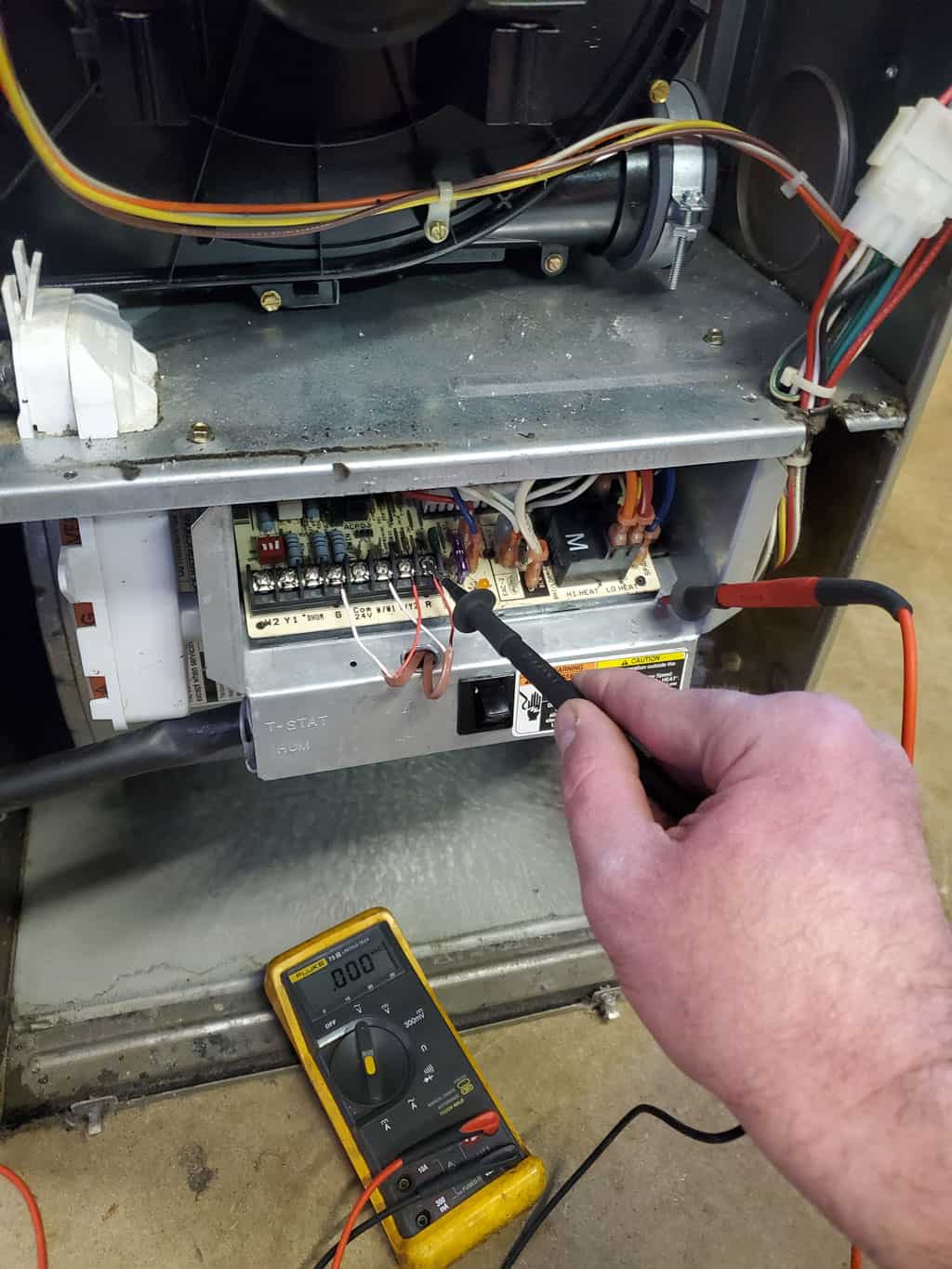 Repairing a furnace.