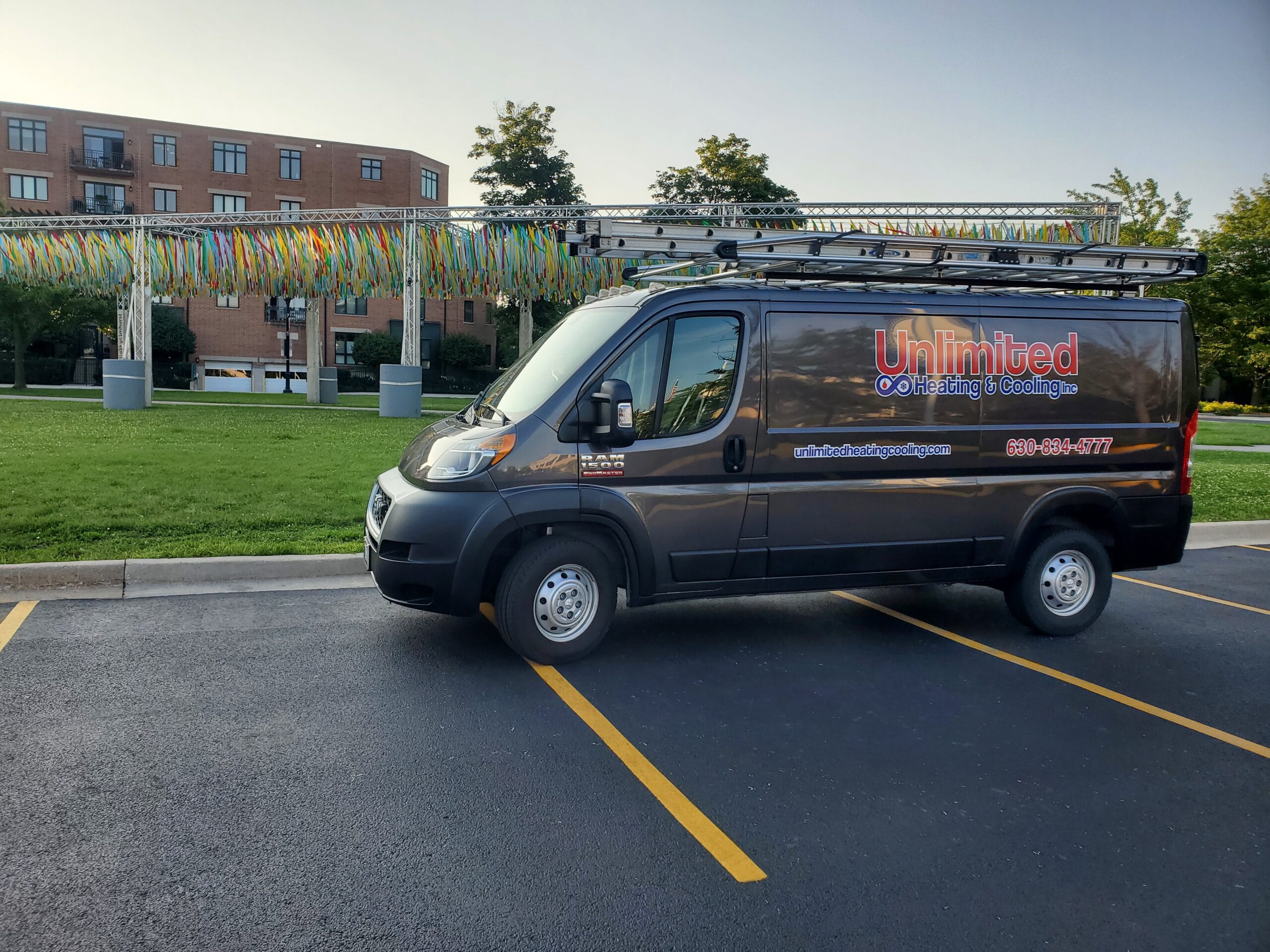 unlimited heating cooling inc hvac elmhust il Unlimited Heating & Cooling Inc. service truck in front of the Umbrella Sky Project in Elmhurst, IL.