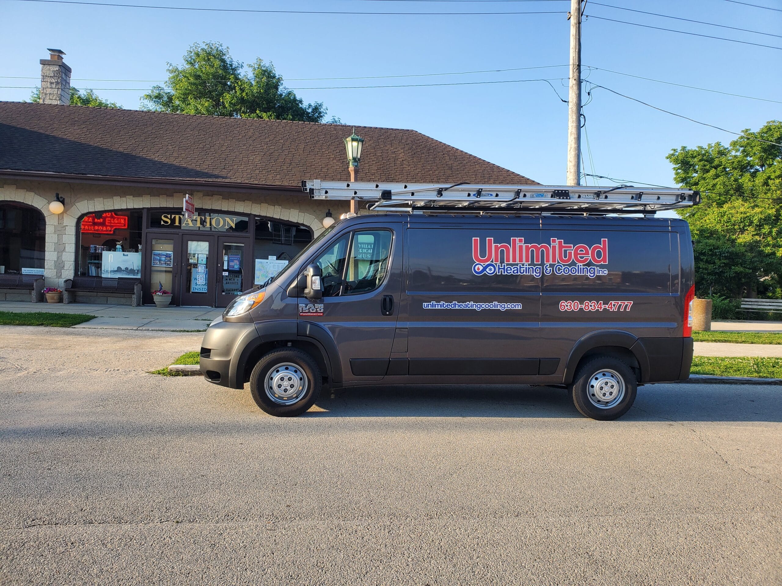 unlimited heating cooling inc hvac villa park il Unlimited Heating & Cooling Inc. service truck in front of the Villa Park Historical Society Museum in Villa Park, IL.